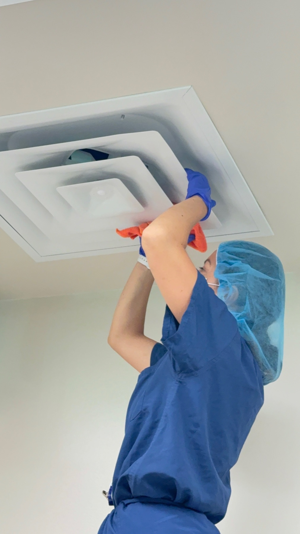 Ceiling diffuser cleaning close-up